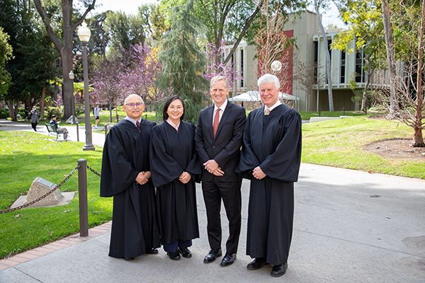 From left, Hon. Richard A. Paez, Hon. Jacqueline N. Nguyen, Dean Andrew Guzman and Hon. David F. Hamilton (Photo/Christopher Wallace)