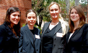Sarah Vesecky '99, middle left, and Tara Cooper, middle right, with PILF co-presidents Carolina Romanelli '11 and Jamie Hoffman '11