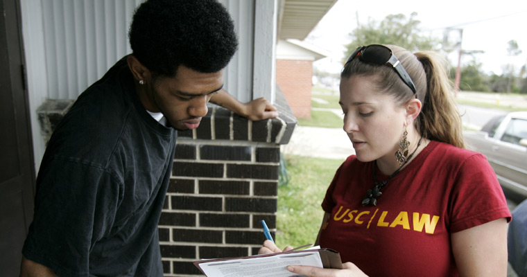 A USC Gould student working on her Public Interest Law certificate collecting signatures for a petition 