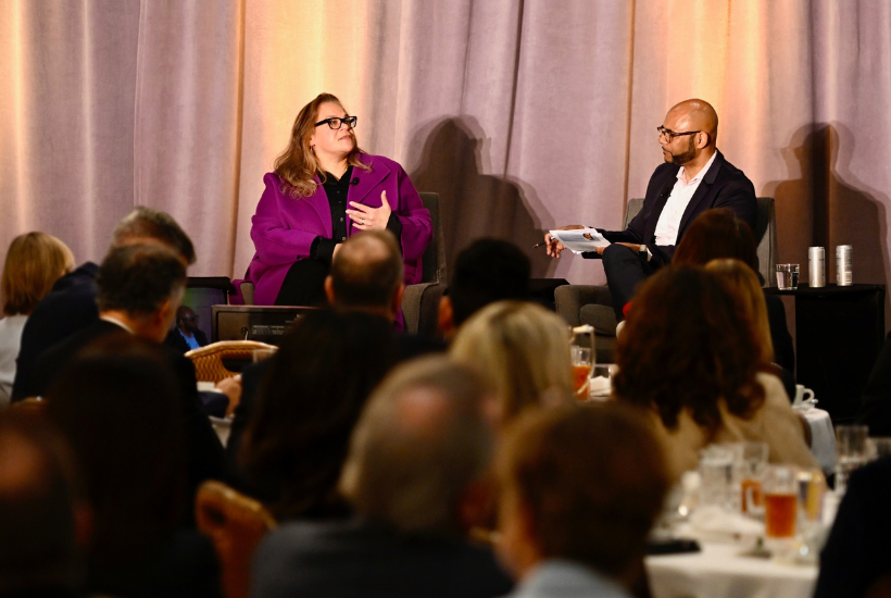 Jackie Hayes, EVP, Legal – Studios & Networks at Warner Bros. Discovery sits with interviewer on stage at the 2024 Intellectual Property Institute.