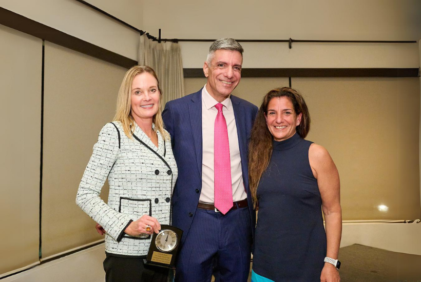 Honoree Laura Burson, Senior Counsel at O'Melveny & Myers, poses with John Ulin, partner at TroyGould, and Ellen Robbins, Litigation Partner at Akerman at the 2024 IP Institute Dinner.